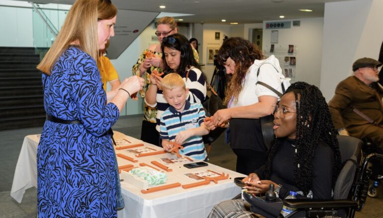 People making small morphs statues