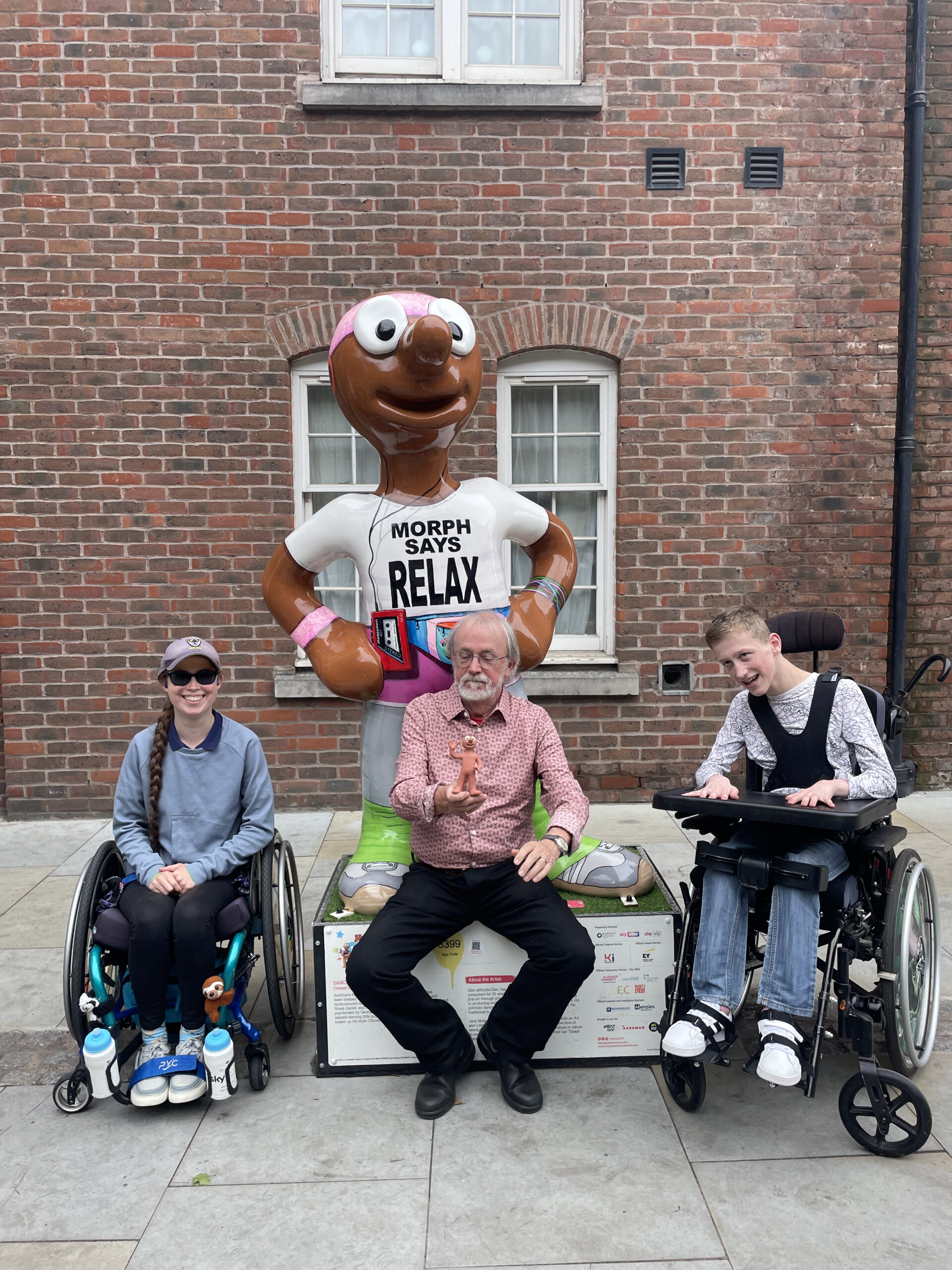 Peter Lord with Morph fans Rebecca and Ben